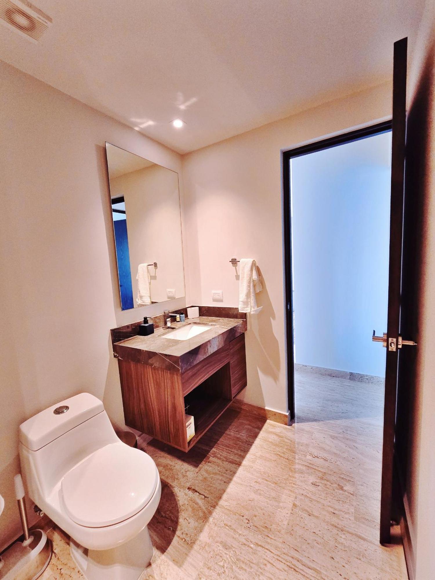 Apartment 1 Bedroom With King Bed And Balcony With Amenities View